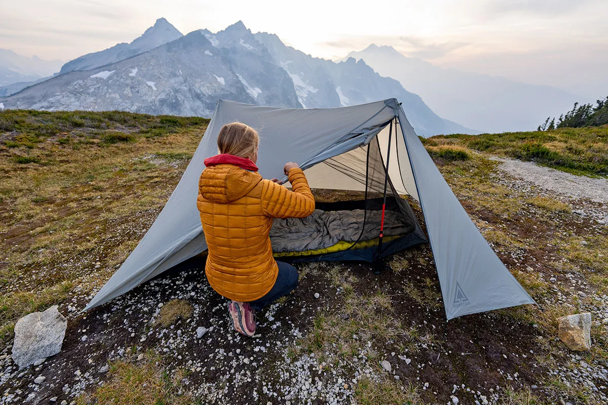 Ultralight tent 2 person setup in mountain environment showing lightweight design and easy setup process